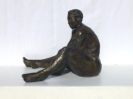 femme reposé faciale, bronze patiné 40x31