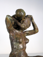 " le jeux" bronze patiné 19x9